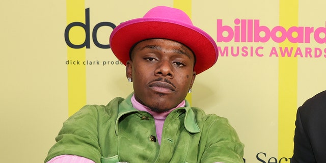 DaBaby poses backstage for the 2021 Billboard Music Awards broadcast May 23, 2021, at Microsoft Theater in Los Angeles. 
