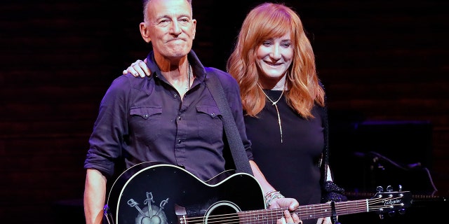Bruce Springsteen and Patti Scialfa take a bow during reopening night of "Springsteen on Broadway" for a full-capacity, vaccinated audience at St. James Theatre on June 26, 2021 in New York City.