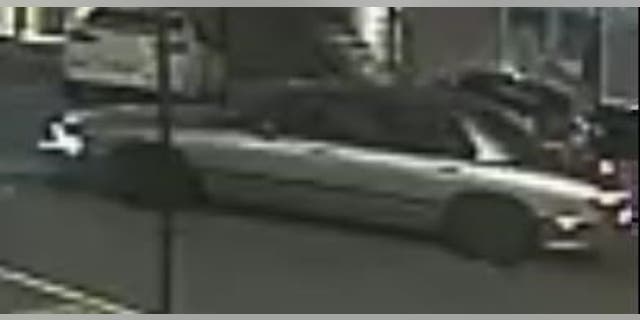 Police say the shooting suspect fled the scene in this 90s model Buick.