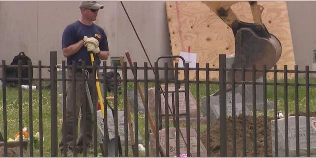 Gravesites being dug up at Gethsemane Cemetery.