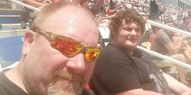 Jeff Moore and Jason are pictured before they started their weight loss journey last June. According to SWNS, they each weighed about 420 pounds.