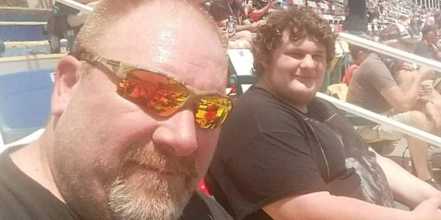 Jeff Moore and Jason are pictured before they started their weight loss journey last June. According to SWNS, they each weighed about 420 pounds.