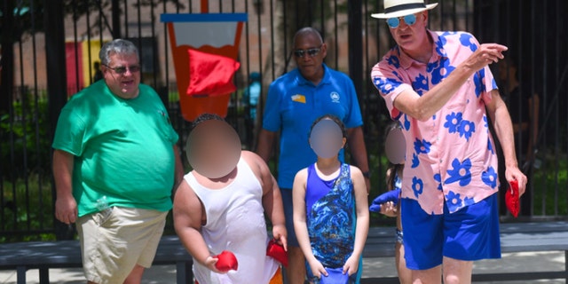 Mayor Bill de Blasio of New York City enjoys playing cornhole games with the city's children. (New York Mayor's Office)