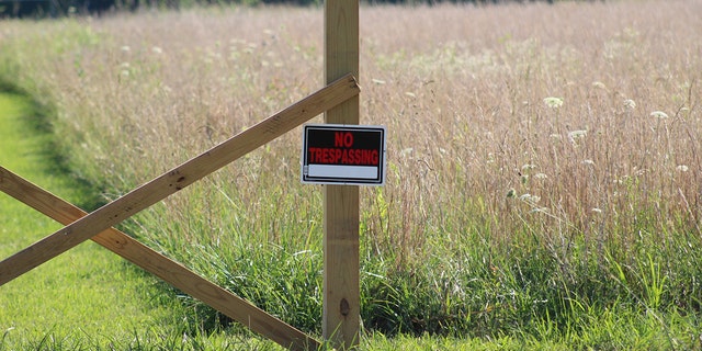 Josh Duggar has been living with third-party custodians as he awaits his child pornography trial later this month. Seen here, a photo outside the home reads ‘No trespassing.’