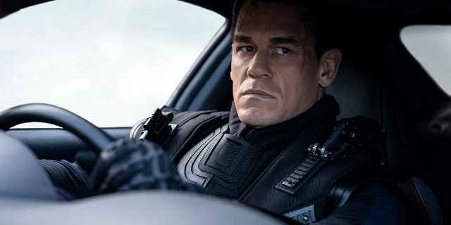 This image released by Universal Pictures shows John Cena in a scene from "F9: The Fast Saga."