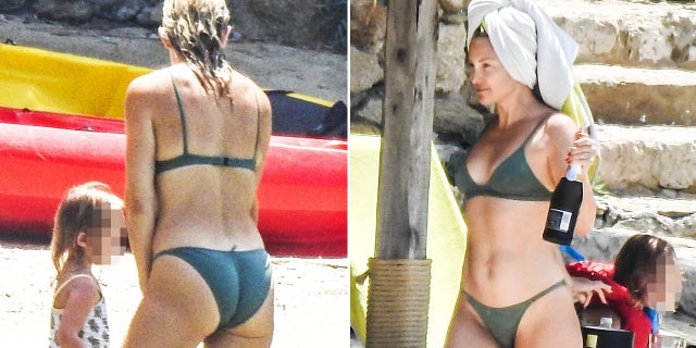 Kate Hudson and Danny Fujikawa, seen with the actresses' daughter Rani Rose and son Bingham, have fun at the beach in Greece. They drank some champagne and shot some selfies.