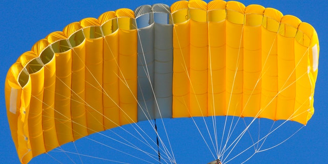 Skydiving is an extreme sport where participants jump from an aircraft and sometimes perform acrobatic maneuvers during free falls before they deploy a parachute for landing.