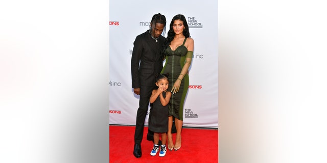 ravis Scott, Kylie Jenner, and Stormi Webster attend the The 72nd Annual Parsons Benefit at Pier 17 on June 15, 2021 in New York City. 