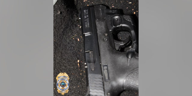 Police retrieved a firearm and arrested three suspects following a drive-by shooting outside a Hooters restaurant on Saturday.