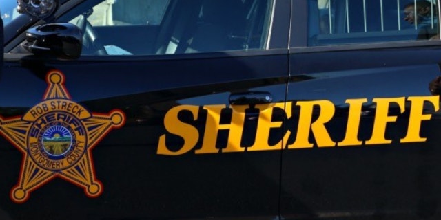 A SWAT standoff in southwestern Ohio ended Wednesday after a man accused of kidnapping three people was forced out of a motel room with tear gas, Montgomery County Sheriff Rob Streck said.