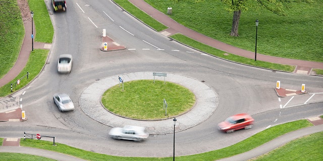 Roundabouts are typically defined with a physical central island or marker.
