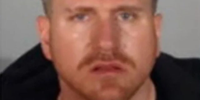 Shane Rayment, 37, is accused of fatally shooting Roberto Fletes in North Hollywood on Sunday and kidnapping his ex-girlfriend. He was arrested in Riverside County Tuesday. (LAPD)