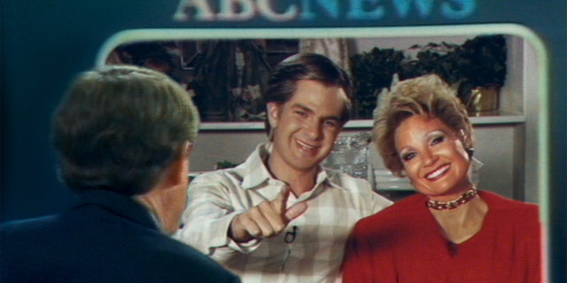 Andrew Garfield as Jim Bakker and Jessica Chastain as Tammy Faye Bakker in the film "The Eyes of Tammy Faye."