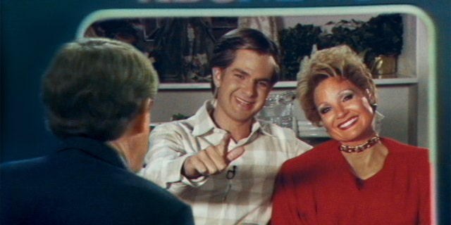 Andrew Garfield as Jim Bakker and Jessica Chastain as Tammy Faye Bakker in the film "The Eyes of Tammy Faye."
