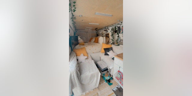 Wilson’s renovated van has a full-sized bed, two benches -- one with a fridge/freezer inside, the other storing a shower -- a monitor for gaming, a ceiling fan and security cameras.