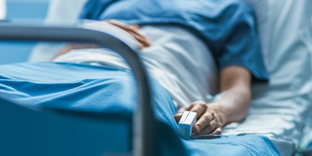 Patient on hospital bed