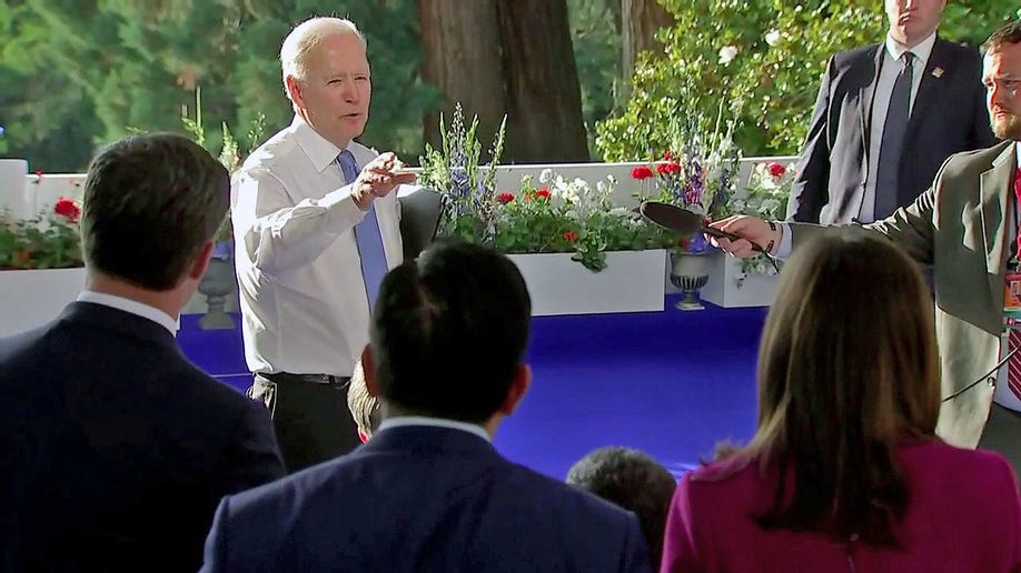President Biden answering a reporter's question following his Geneva summit with Russian president Vladimir Putin.