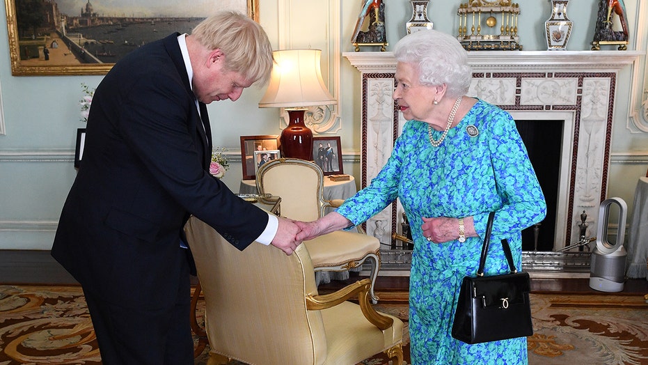 Queen Elizabeth meets Boris Johnson at Buckingham Palace for their first in-person audience since the pandemic