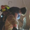Miami-Dade fire rescue pull a boy from the rubble alive. 