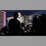 People view a partially collapsed building early Thursday, June 24, 2021, in the Surfside area of Miami, Fla. A partial building collapse in Miami caused a massive response early Thursday from Miami Dade Fire Rescue, according to a tweet from the department's account. Miami Dade Fire Rescue is conducting search and rescue. Authorities had no word yet on casualties, or details of how many people lived in the building. (AP Photo/Wilfredo Lee)