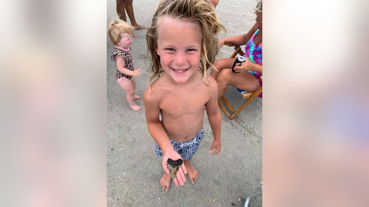 Xander, 5, found a rather large tooth that measures 3.25-by-2.25 inches during his recent trip to North Myrtle Beach, S.C. His mother Kelly Buck tells Fox News that fossil identification enthusiasts on Facebook have told her it looks like a megalodon tooth.