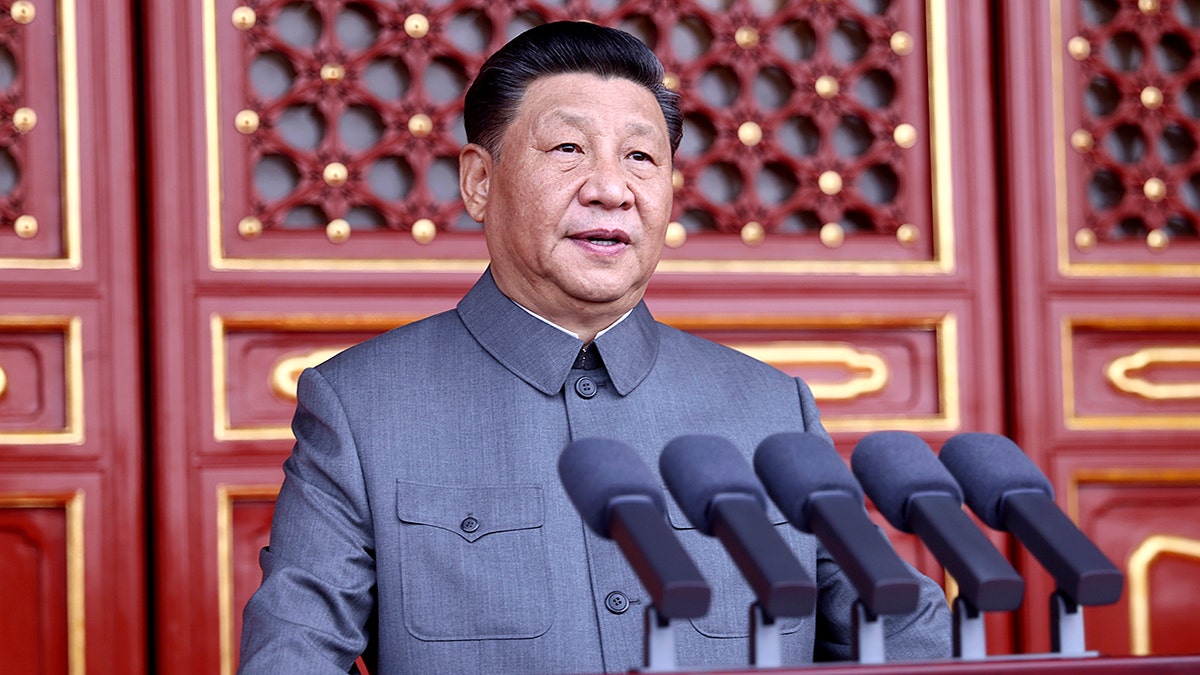 In this photo provided by China's Xinhua News Agency, Chinese President and party leader Xi Jinping delivers a speech at a ceremony marking the centenary of the ruling Communist Party in Beijing, China, Thursday, July 1, 2021. China’s Communist Party is marking the 100th anniversary of its founding with speeches and grand displays intended to showcase economic progress and social stability to justify its iron grip on political power that it shows no intention of relaxing. (Ju Peng/Xinhua via AP)