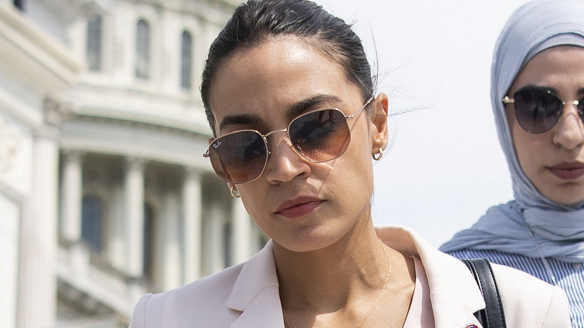 Rep. Ocasio-Cortez on the steps of the Capitol