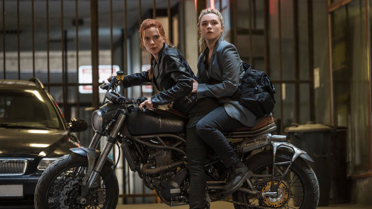 This image released by Marvel Studios shows Scarlett Johansson, left, and Florence Pugh in a scene from "Black Widow." 