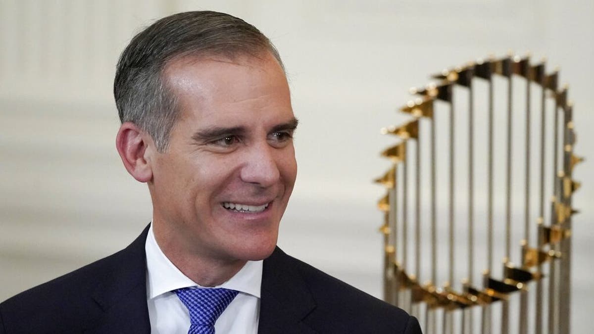 Los Angeles Mayor Eric Garcetti arrives for an event to honor the 2020 World Series champion Los Angeles Dodgers baseball team at the White House, Friday, July 2, 2021, in Washington. (AP Photo/Julio Cortez)