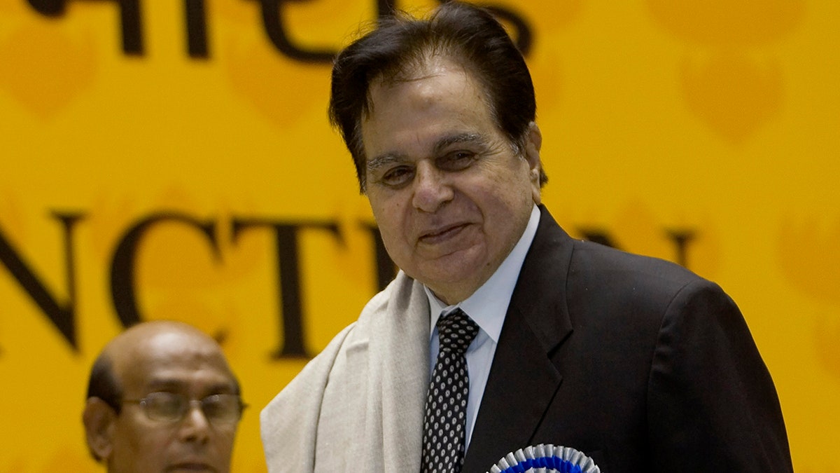 Veteran Bollywood actor Dilip Kumar, right, receives a Lifetime Achievement award at the 54th National Film Award ceremony in New Delhi, India on Sept. 2, 2008.  (AP Photo/Gurinder Osan, File)