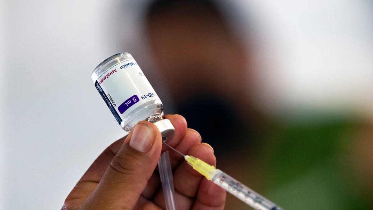  July 7, 2021: A health worker prepares to administer a jab of the AstraZeneca COVID-19 vaccine during a vaccination drive for people ages 30 to 39 in Mexico City.