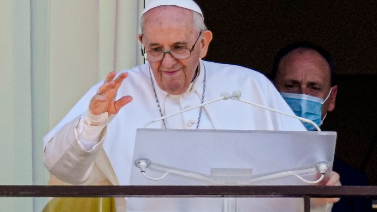 Pope Francis appears on a balcony of the Agostino Gemelli Polyclinic in Rome, Sunday, July 11, 2021. (AP Photo/Alessandra Tarantino)