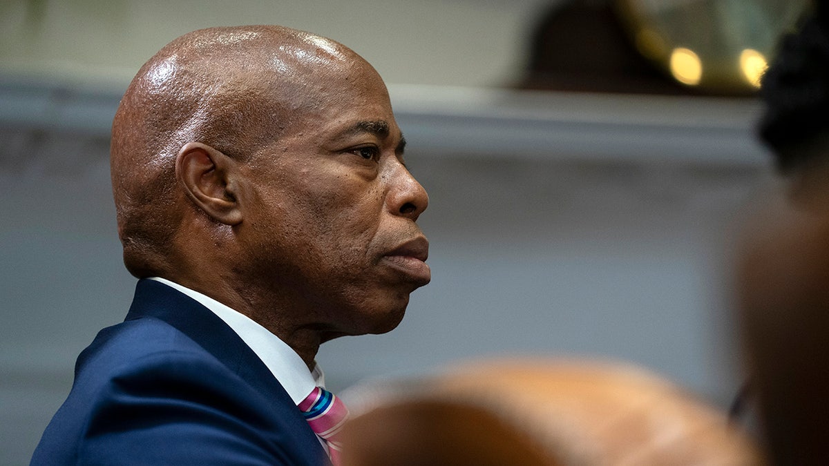 Brooklyn Borough President and New York City mayoral candidate Eric Adams listens as President Biden speaks during a meeting on reducing gun violence, in the Roosevelt Room of the White House, Monday, July 12, 2021, in Washington.