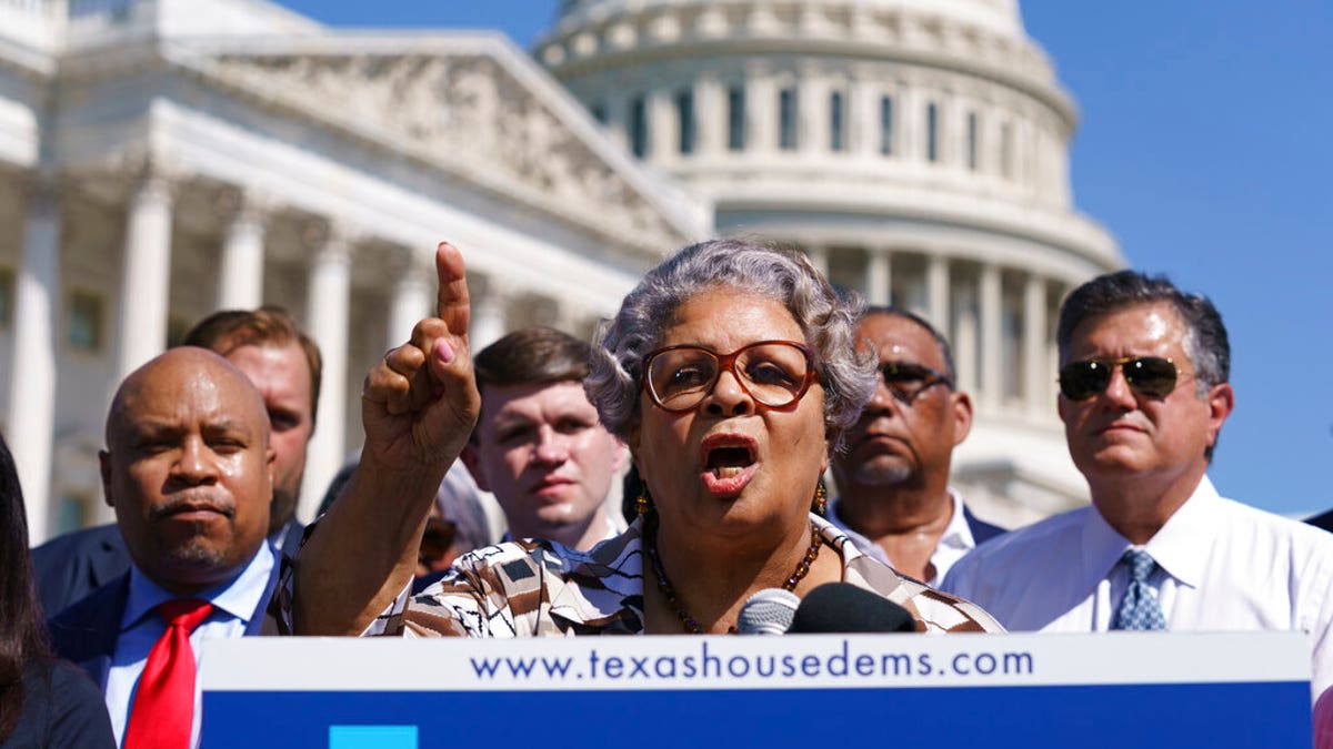 FILE - In this July 13, 2021, file photo Texas State Rep. Senfronia Thompson, dean of the Texas House of Representatives, speaks as Democratic members of the Texas legislature hold a news conference at the Capitol in Washington. Texas Democrats are starting a second week of holing up in Washington to block new voting laws back home. More than 50 Democrats in the Texas House of Representatives had plans Monday to continue on a media blitz in the nation's capital and pressure Congress to act on federal voting rights. (AP Photo/J. Scott Applewhite, File)