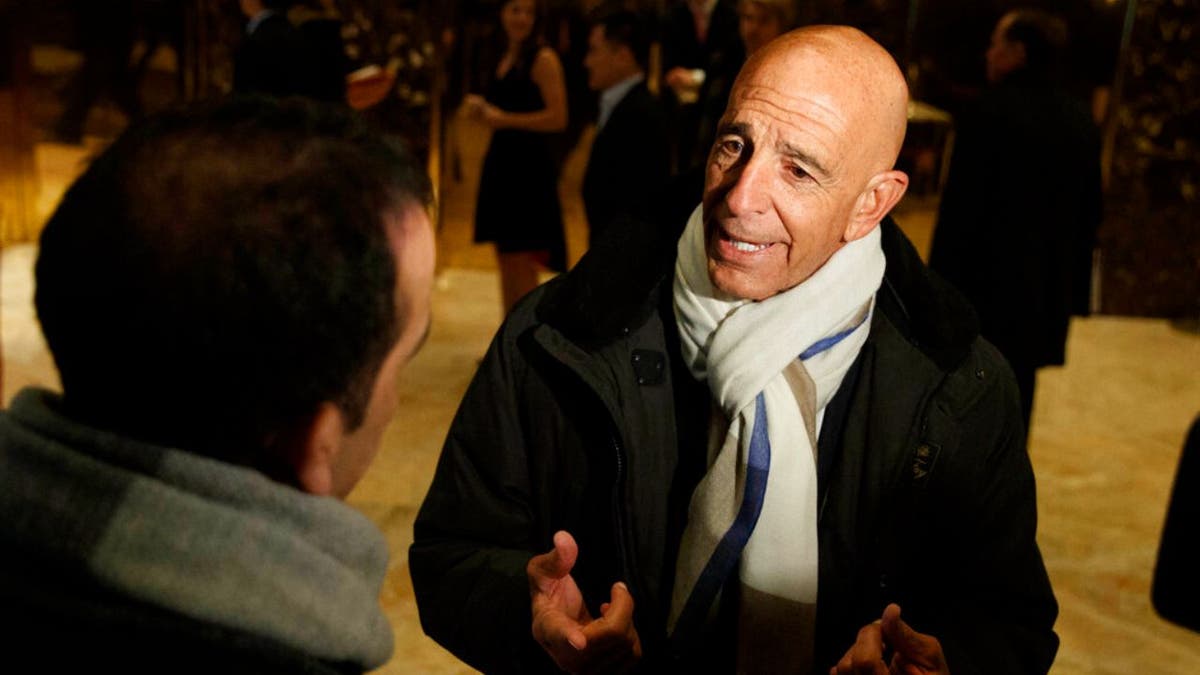 This photo from Tuesday Jan. 10, 2017, shows Tom Barrack speaking with reporters in the lobby of Trump Tower in New York before meeting with President-elect Donald Trump. 