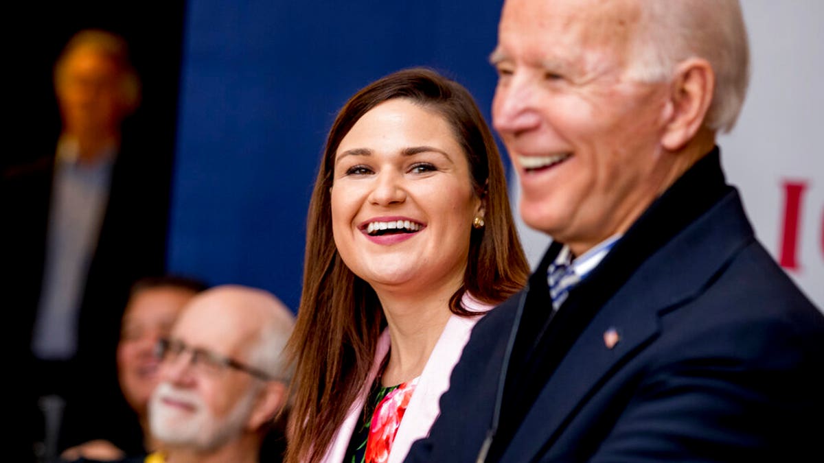 Democratic presidential candidate Joe Biden, right, and Rep. Abby Finkenauer, D-Iowa.  (AP Photo/Andrew Harnik)