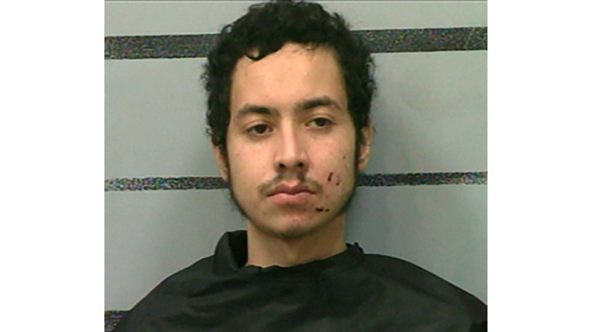 Omar Soto-Chavira is charged in the fatal shooting of a SWAT officer in Texas, prosecutors say. (Lubbock County Detention Center via Associated Press)