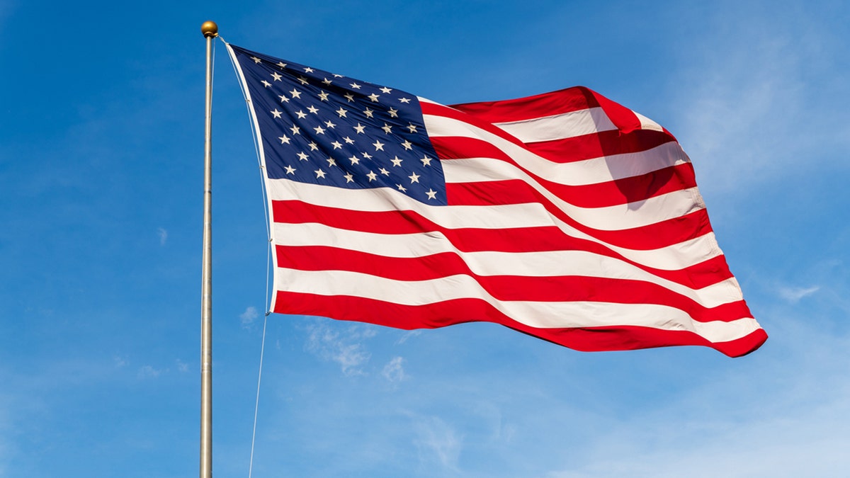 American Flag waving on a flagpole