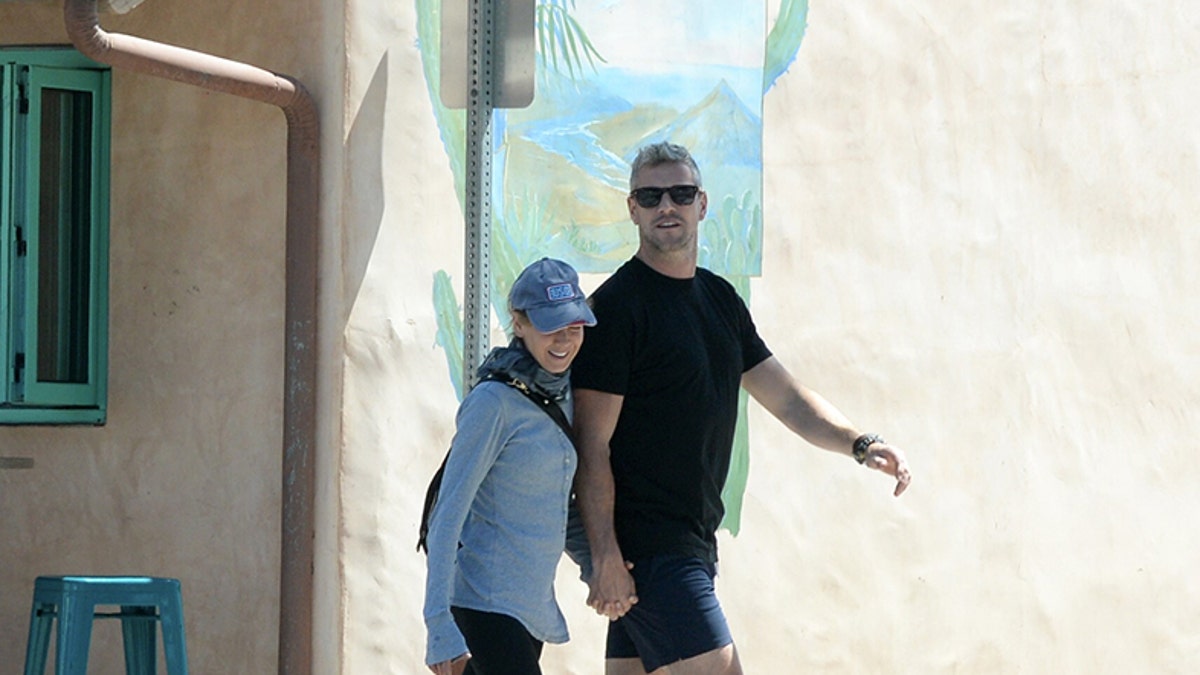 Renee Zellweger and Ant Anstead walk hand-in-hand