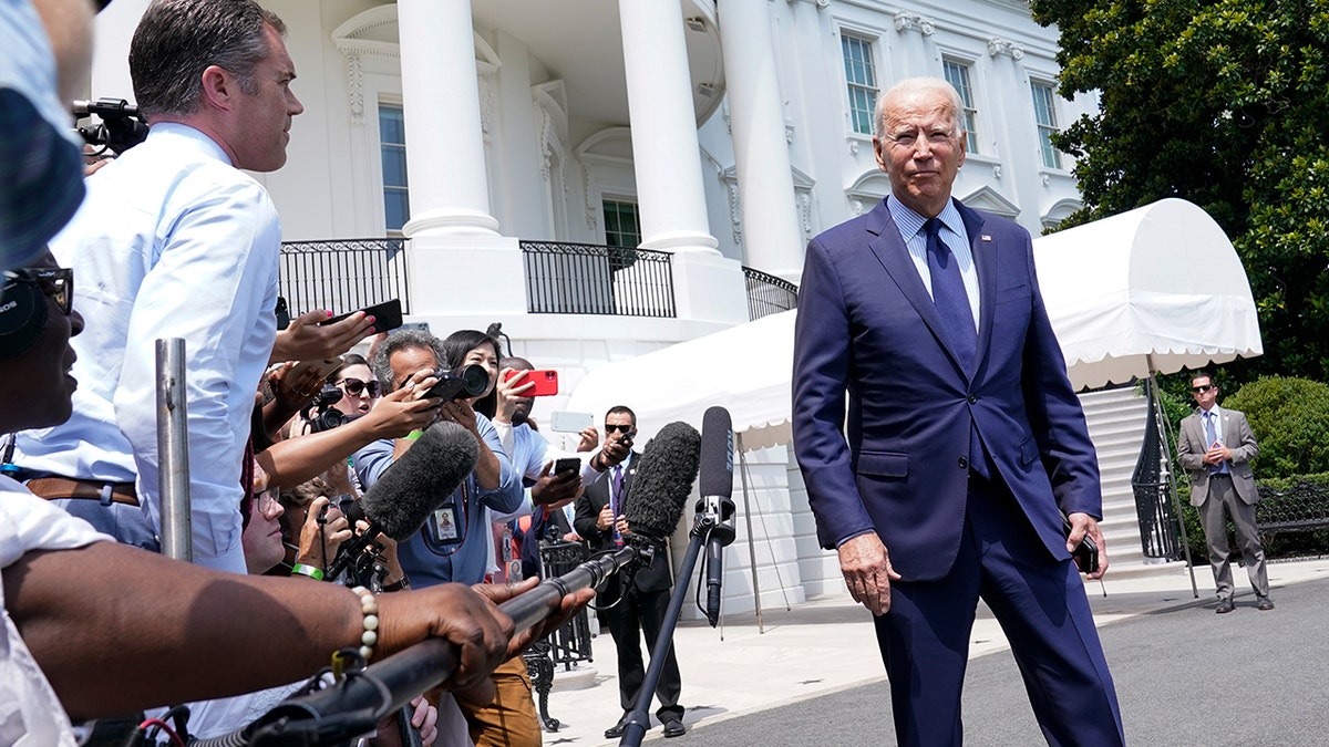 photo of President Biden and reporters