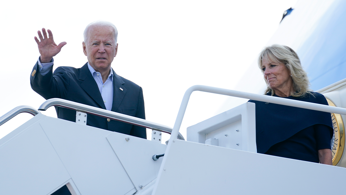 President Joe Biden and first lady Jill Biden board Air Force One at Andrews Air Force Base, Md., on Thursday. (AP)