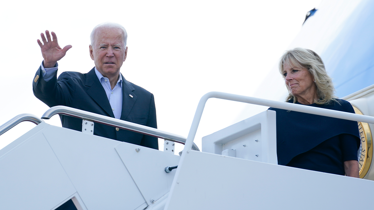 President Joe Biden and first lady Jill Biden board Air Force One at Andrews Air Force Base, Maryland, on Thursday. (AP)