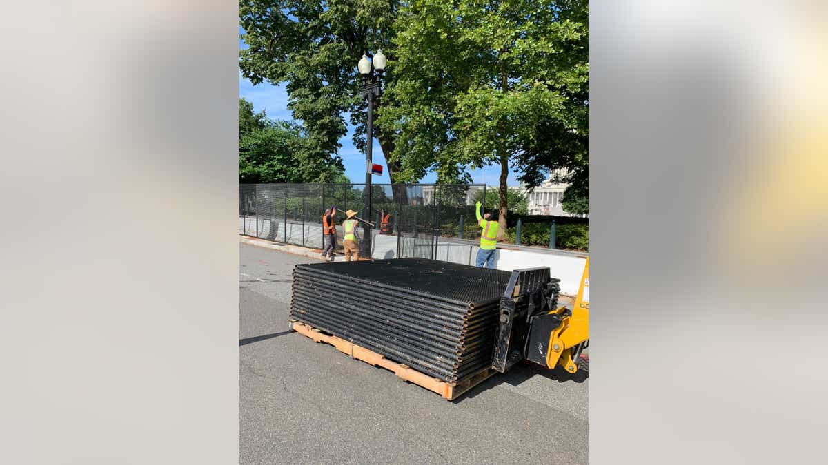 Crews began taking down the inner Capitol fence on Saturday morning. (Kelly Laco/Fox News)