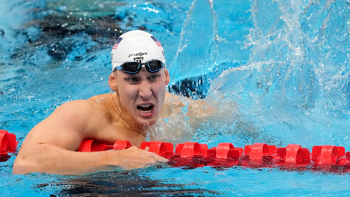Chase Kalisz of the US reacts after winning the Men's 400m individual medley at the 2020 Summer Olympics