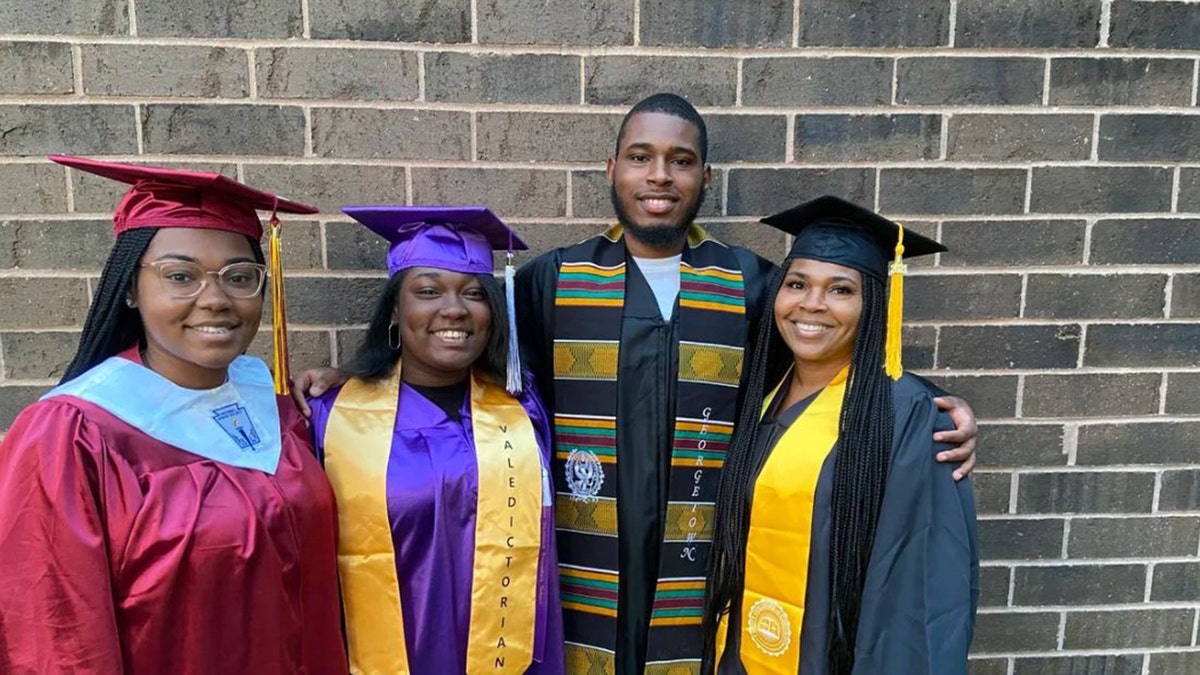 Alisa Perry Johnson (far right) and her three children all graduated this year. Her middle daughter Makaela (far left) graduated high school, her youngest daughter Mia (middle left) graduated elementary school and her eldest son Malik (middle right) graduated college.