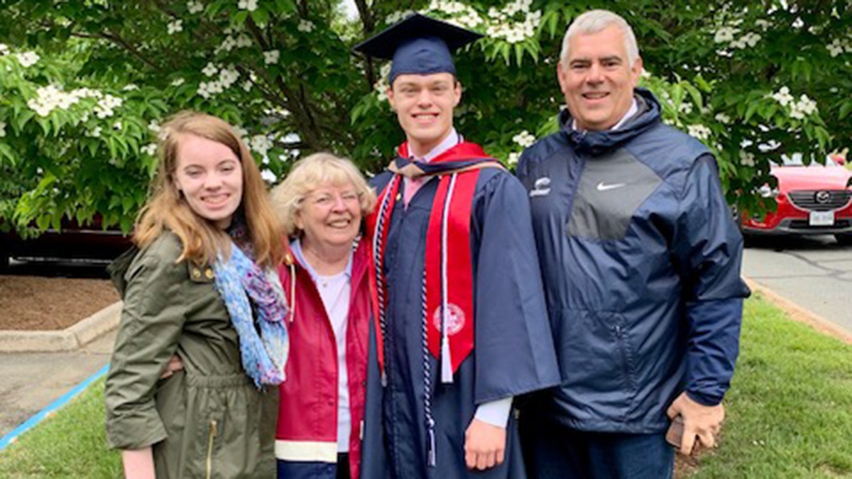 Dickman is pictured with his family. Now that he’s graduated from both high school and college, he plans to attend law school in Europe. He hopes to be an international business lawyer.