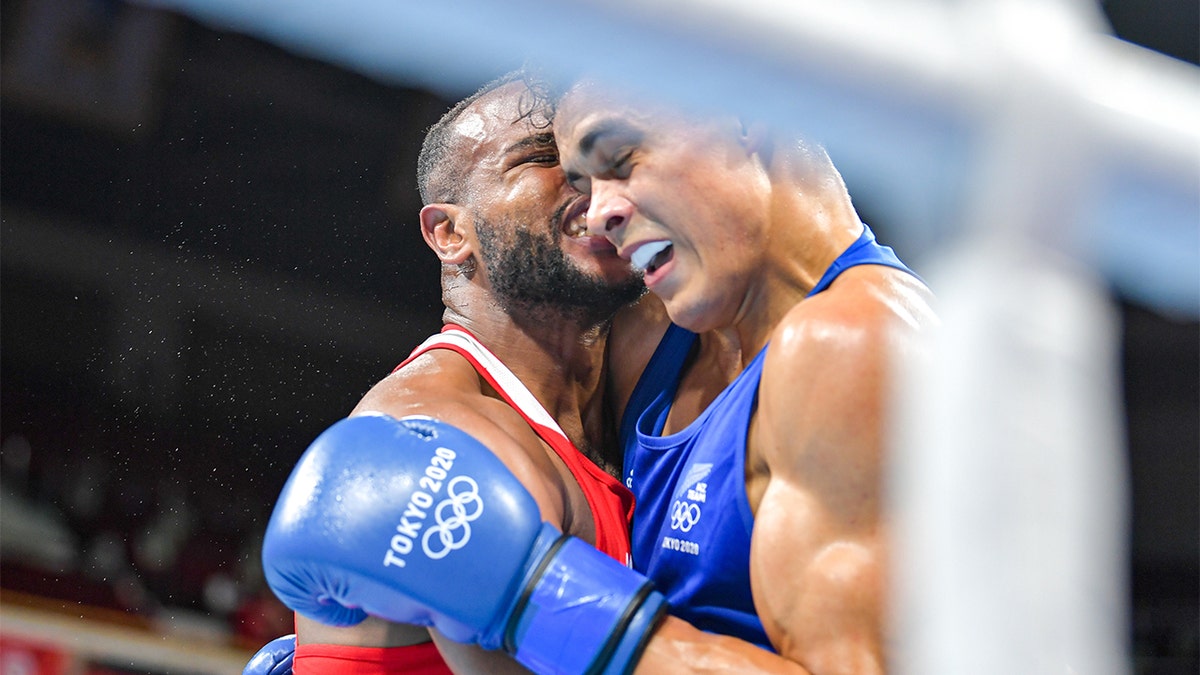 Morocco’s Youness Baalla was disqualified from the Olympics on Tuesday after he attempted to bite the ear of New Zealand boxer David Nyika, organizers said.