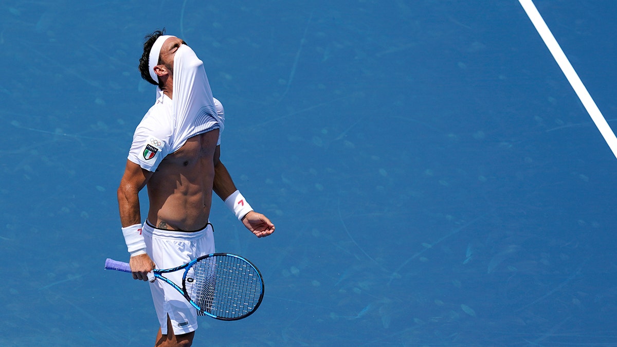 Fabio Fognini reacts during Daniil Medvedev match