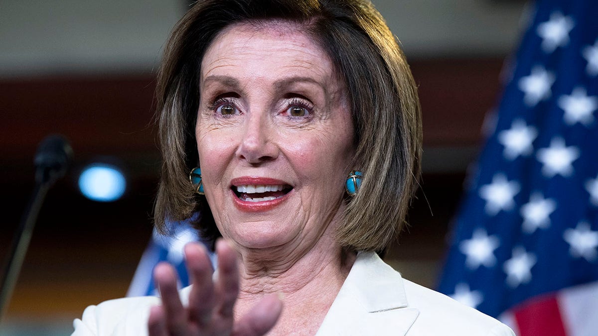 Pelosi at news conference in Capitol Visitor Center in Washington