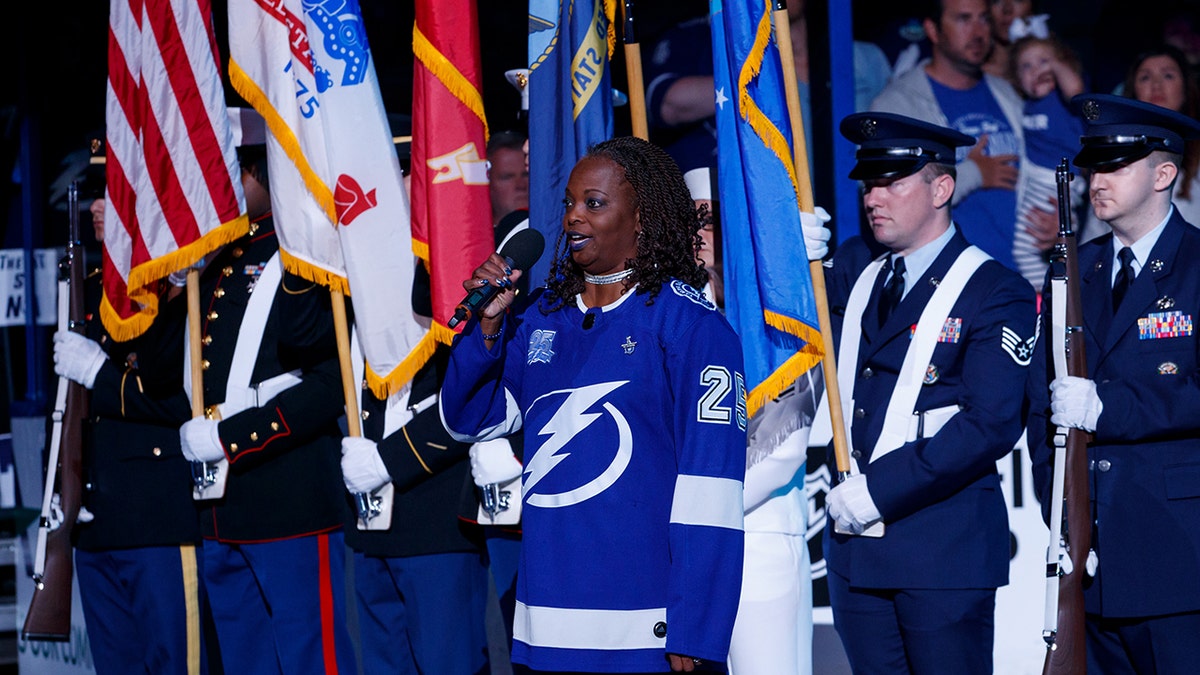 Sonya Bryson sings the national anthem before an NHL game at Amalie Arena on April 12, 2018 in Tampa, Florida. (Getty Images)